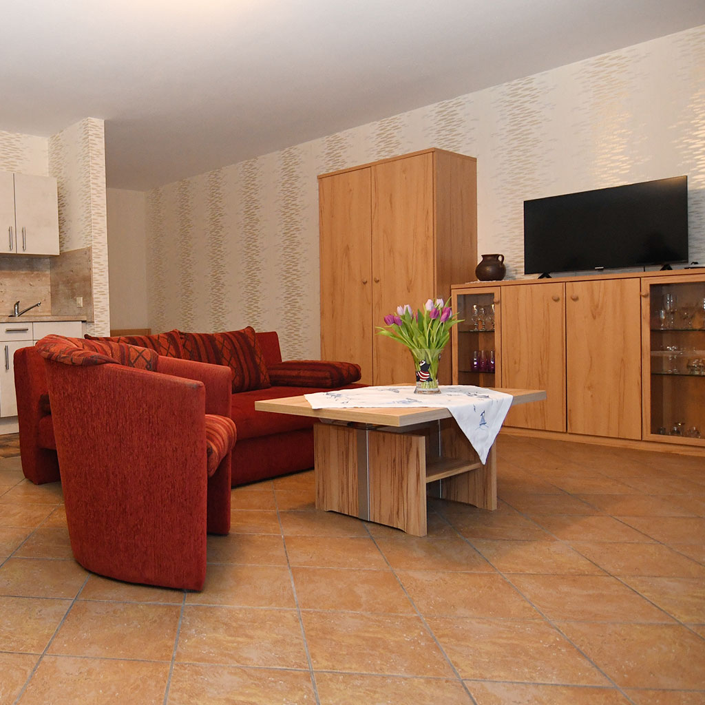 Ferienwohnung Grages, Wohnung 1, Sitzecke mit Fernseher